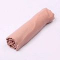 Pink faux linen scarf in a rolled display, soft solid color sun protection wrap - 41# Skin Pink