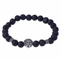 Black 8mm lava rock bead bracelet with silver lion head accent on white background - Lava Stone Style