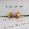 Macro shot of 15x17mm colorful enamel sparrow charms with gold outlines for DIY jewelry - No.3 (Red Yellow Pink-Purple)