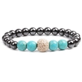 Elastic beaded bracelet with hematite beads, blue turquoise, and lava rock stone - White