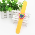 Kids silicone slap bracelet in bright yellow with a colorful layered heart design - Orange Heart
