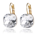 Detail of cushion-cut crystal drop earrings with gold-tone leverback hooks on white background - White