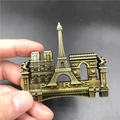 Vintage bronze 3D Paris souvenir fridge magnet featuring Eiffel Tower and Notre Dame - France Style