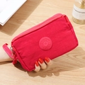 Pochette in tessuto rosa brillante con tripla cerniera e logo sportivo - Rosa