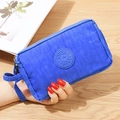 Pochette in tessuto di nylon blu con tre tasche con zip e logo sport con cinturino - Blu Reale