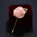 Pink ribbon rose brooch with golden pin and leaf on luxury red velvet jewelry box - Apricot