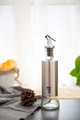 Leak-proof glass and stainless steel oil dispenser bottle with printed oil label text - Oil