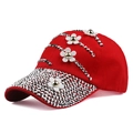 Red baseball cap with 3D white flowers and silver rhinestones shown at a 45-degree angle - Adjustable / Red