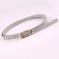 Slim grey PU leather belt for women with elegant gold metal buckle and textured finish - Gray