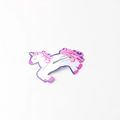 Close-up of colorful cartoon unicorn hair clip with vibrant enamel finish for girls - Unicorn
