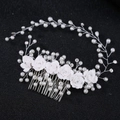 Silver bridal hair comb featuring white ceramic roses, pearls, and crystals on black background - Hair Comb / Silver