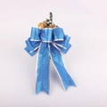 Fiocco di Natale blu scintillante con aghi di pino e bacche per decorazione - 25cm Fiocco Blu