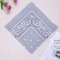 Dark grey paisley sports bandana with cashew flower pattern on wooden background - Light Gray