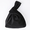 Elegant black velvet knotted wristlet handbag with a soft texture for weddings - Black