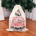 Christmas burlap drawstring gift bag with merry holly jolly print on wood floor - Type D Printed Linen Bag (Holly Jolly Text/Snowflakes)