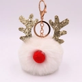 Dettaglio del portachiavi a forma di renna in peluche con pelliccia bianca e corna d'oro - Bianco