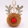 Detail of reindeer plush keychain with brown faux fur, gold sequined antlers and red nose - Coffee