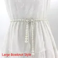Elegant white pearl waist chain belt featuring a large rhinestone-encrusted bow clasp - Large Bow Style