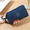 Portafoglio lungo in tessuto blu navy con doppia cerniera e cinturino da polso - Blu scuro