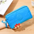 Portafoglio in tessuto azzurro con tre cerniere e logo sportivo per donna - Celeste
