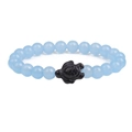 Detail of light blue beaded bracelet featuring a black sea turtle charm centerpiece - Aquamarine Agate