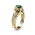 Vintage gold ring with emerald green zircon center stone and diamond accents - US 7 / Yellow