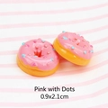 Macro detail of 0.9x2.1cm pink resin doughnut accessory for DIY hair clips and jewelry - 0.9x2.1cm / Dotted Doughnut - Pink