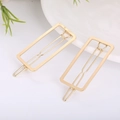 Set of two minimalist rectangular gold geometric hair clips in a modern metallic finish - Rectangle Gold