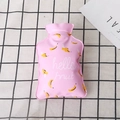 Pink PVC hot water bottle with banana pattern on a black and white checkered fabric - Banana / Pink