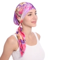 Detail of floral printed headscarf showing the purple gradient pattern and long tail straps - Light Purple & Rose Red