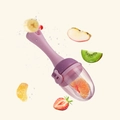 Purple silicone baby fruit feeder with fresh fruit slices on a clean beige background - Standard Push Type / Pink