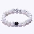 Minimalist 8mm white turquoise beaded bracelet with single matte black accent stone - White Howlite Texture Beads With Single Matte Black Bead