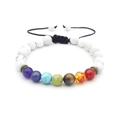 Detail of adjustable 7 chakra healing bracelet with white marble beads and bronze spacers - Howlite