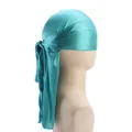 Close-up of turquoise silky durag with long straps for headwrap and hair styling - Lake Blue