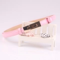 Pink patent leather belt for women with elegant golden buckle on a white background - Pink