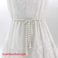 Chaîne de taille fine en perles avec boucle nœud en strass étincelants et glands perlés - Style Petit Noeud