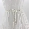 Ceinture élégante en perles avec boucle florale et glands pour robes de femmes - Style Fleurs de Perles Symétriques