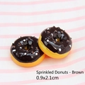 Miniature coffee-brown resin donut charm with white dots and 0.9x2.1cm size markings - 0.9x2.1cm / Dotted Doughnut - Coffee Brown