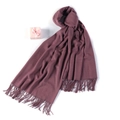 Dusty rose cashmere wool blend scarf with fringe tassels next to a pink gift box - Leather Purple