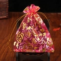 Red organza jewelry pouch with gold rose foil print and convenient drawstring closure - Rose Red