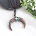 Ethnic vintage necklace with dark wood crescent pendant and turquoise bead on woven cord - Style 6