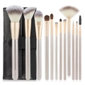 Detail van de 12-delige champagne make-up kwastenset met luxe zwarte lederen opbergetui. - Champagne Goud Handvat (Zwarte Tas)
