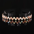Sparkling wave rhinestone headband in champagne and iridescent white on black base - Champagne