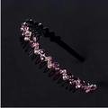 Detail of non-slip wavy headband with pink rhinestones and teeth on black base - Purple