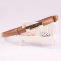 Slim brown belt for women featuring a polished gold rectangular metal buckle - Camel