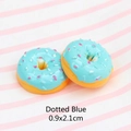 Macro detail of sky blue resin donut accessory with texture and 0.9x2.1cm dimensions - 0.9x2.1cm / Dotted Doughnut - Blue