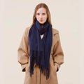 Solid navy blue cashmere wool blend scarf with fringe detail on a camel coat - Navy Blue
