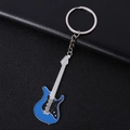 Blue electric guitar metal alloy keychain with silver ring on black leather texture - Large Blue Guitar