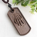 Ethnic style necklace with dark brown skull hand wood pendant and woven rope - Style 18