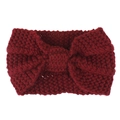 Detail of chunky knit winter headband in dark red with a stylish twist knot design - Dark Red